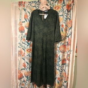 Green, animal print jumpsuit from Zara